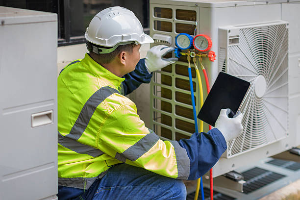 Professional Ductwork Repair technician working in Montchanin, DE